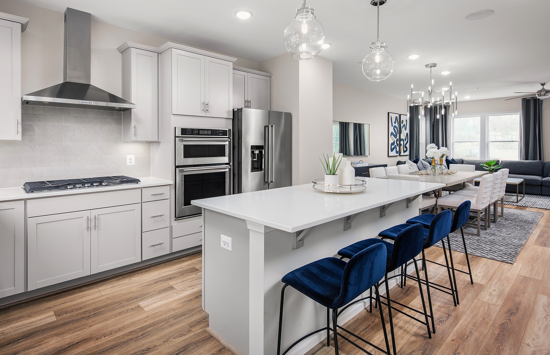 Pulte's Halston end-unit townhome features an oversized island in the gourmet kitchen.