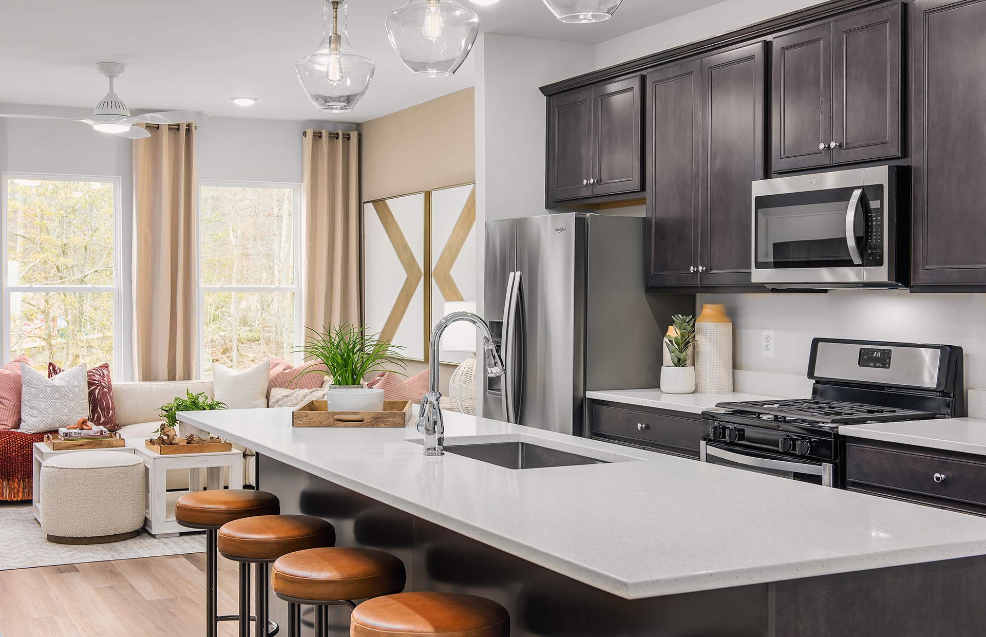 Pulte's Attwood townhome features a center kitchen with a gathering room that maximizes your entertaining space.