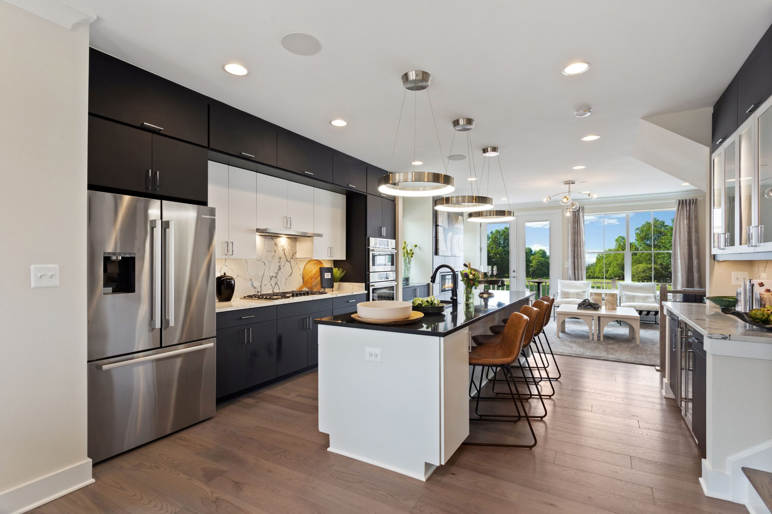Craftmark offers high-end included features like Shaw® 7 Vinyl Plank flooring, a sweeping kitchen island, and Energy Star® Bosch® stainless steel appliances.